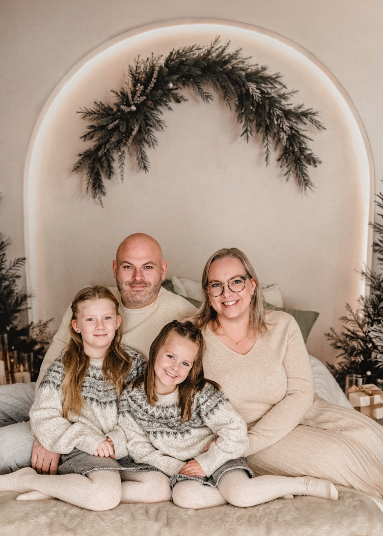 Familienfoto im weihnachtlichen Bett-Set